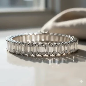 Elegant baguette-cut diamond bracelet crafted from polished sterling silver.