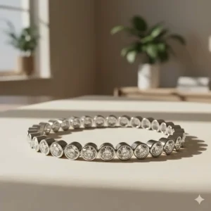 An eternity-style bezel-set diamond tennis bracelet with continuous sparkle, a classic jewelry piece.