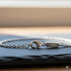 Secure lobster clasp detail on the delicate sterling silver diamond bracelet.
