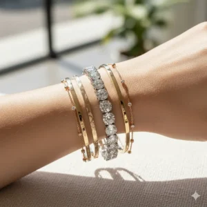 Diamond bezel bracelet layered and stacked with other fine jewelry bangles for a fashionable look.