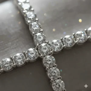 Macro shot focusing on the clarity and cut of the diamonds on the cross bracelet.