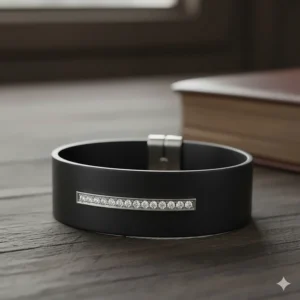 A premium black leather cuff bracelet with a subtle, single-row diamond accent bar, perfect for a man.