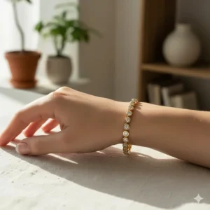 Stylish woman wearing a delicate gold diamond bezel bracelet on her wrist, showcasing how it looks when worn.