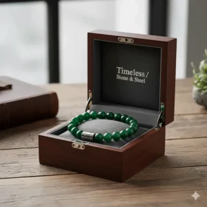 A luxury wooden gift box containing a new jade bracelet, perfect for a thoughtful men's gift.