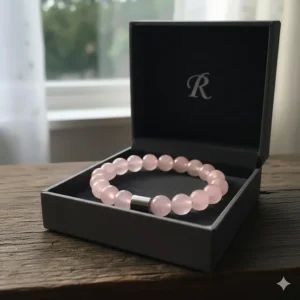 The rose quartz bracelet for men presented in an elegant gift box, ideal for gifting or safe storage.