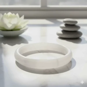 Simple, elegant white jade bracelet symbolizing clarity of mind, focus, and peaceful relationships.