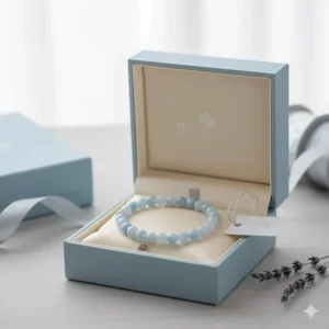The blue lace agate bracelet carefully placed inside its elegant branded gift box, ready to be presented as a thoughtful gift for a loved one.