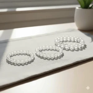 Comparison of clear quartz bracelet bead sizes (6mm, 8mm, and 10mm) to help customers choose the right fit.