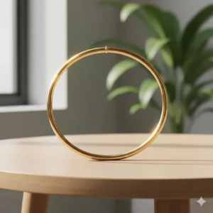 High-detail photorealistic close-up of solid, high-polish gold bangle bracelets showing their continuous circular shape.