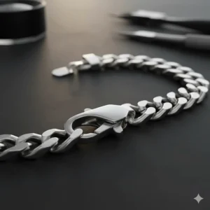 Detailed shot of a secure lobster claw clasp on a thick Cuban curb chain bracelet.