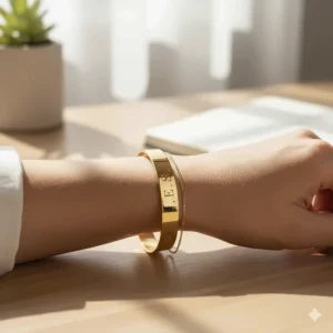 Close-up illustration of an adjustable cuff bracelet for women featuring custom engraved initials.