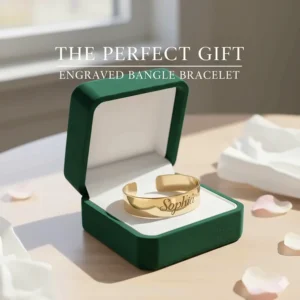 A minimalist illustration of an engraved bangle bracelet inside a premium velvet gift box.