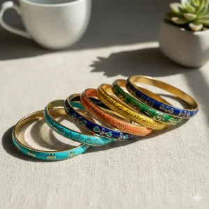 A variety of bright hues including turquoise, coral, and navy in a colorful enamel bangle set.
