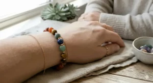 A multi-colored 7 chakra crystal healing bracelet for women designed to balance physical and spiritual energy.