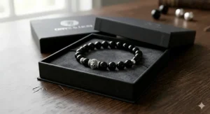 A minimalist black onyx bracelet presented in a premium leather gift box for men.
