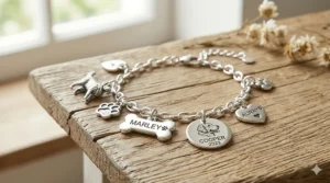 Personalized dog charm bracelets for dog lovers featuring custom engraved pet names.