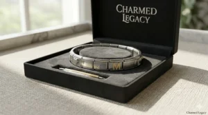 A modular stainless steel Italian charm bracelet presented in a luxury jewelry gift box.
