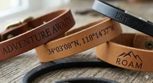 Close-up view of crisp laser text engraving on a brown personalized flat leather bracelet.