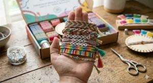 A stack of beautifully completed, multi-colored handmade friendship bracelets with unique pattern designs.