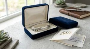 A custom engraved men's ID bracelet inside a luxury gift box for Father's Day.