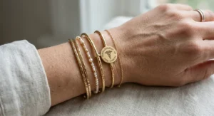 Illustration of a woman wearing a stack of trendy gold bangles mixed with a fashionable medical alert bracelet.