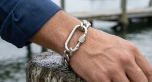 Heavy-duty stainless steel carabiner link bracelet featuring industrial style lock hardware