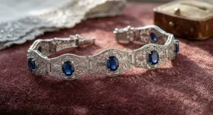 An antique-inspired filigree link bracelet set with oval September birthstone sapphires.