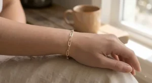 14K two-tone gold paperclip chain bracelet designed to fit small wrists comfortably