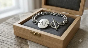 Custom initial stainless steel toggle bracelet packaged in a gift box