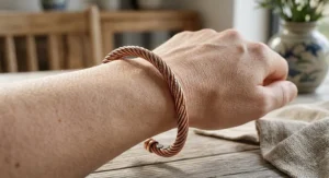 Detailed view of an elegant unisex copper magnetic therapy bracelet used for wrist arthritis support.