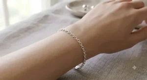 Illustration highlighting a delicate sterling silver link bracelet resting on skin without irritation