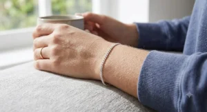Minimalist tarnish-resistant silver bracelet styled for effortless daily wear and casual outfits