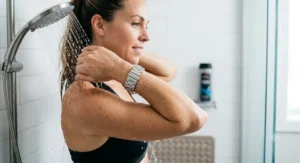 Person taking a post-workout shower wearing a tarnish-resistant waterproof stainless steel bracelet.