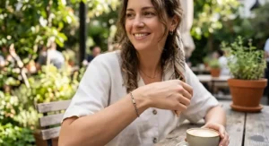 Woman comfortably wearing a stylish titanium chain bracelet with no risk of metal allergy rash