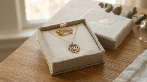 An elegant silk cord bracelet for delicate jewelry presented in a minimalist gift box.